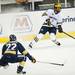 Michigan sophomore left wingman Phil Di Giuseppe quickly stops in the game against Windsor on Tuesday. The Wolverines won 7-3. Daniel Brenner I AnnArbor.com